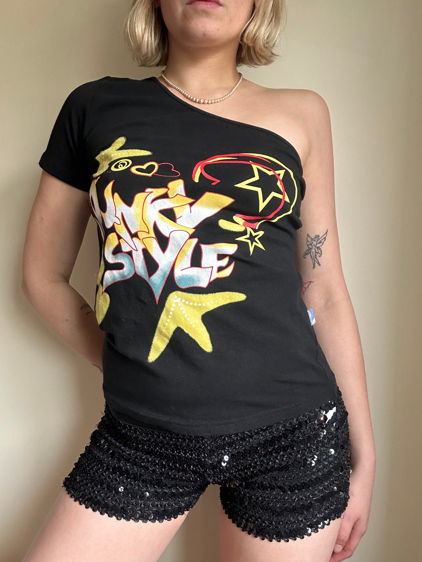 One shoulder graphic top