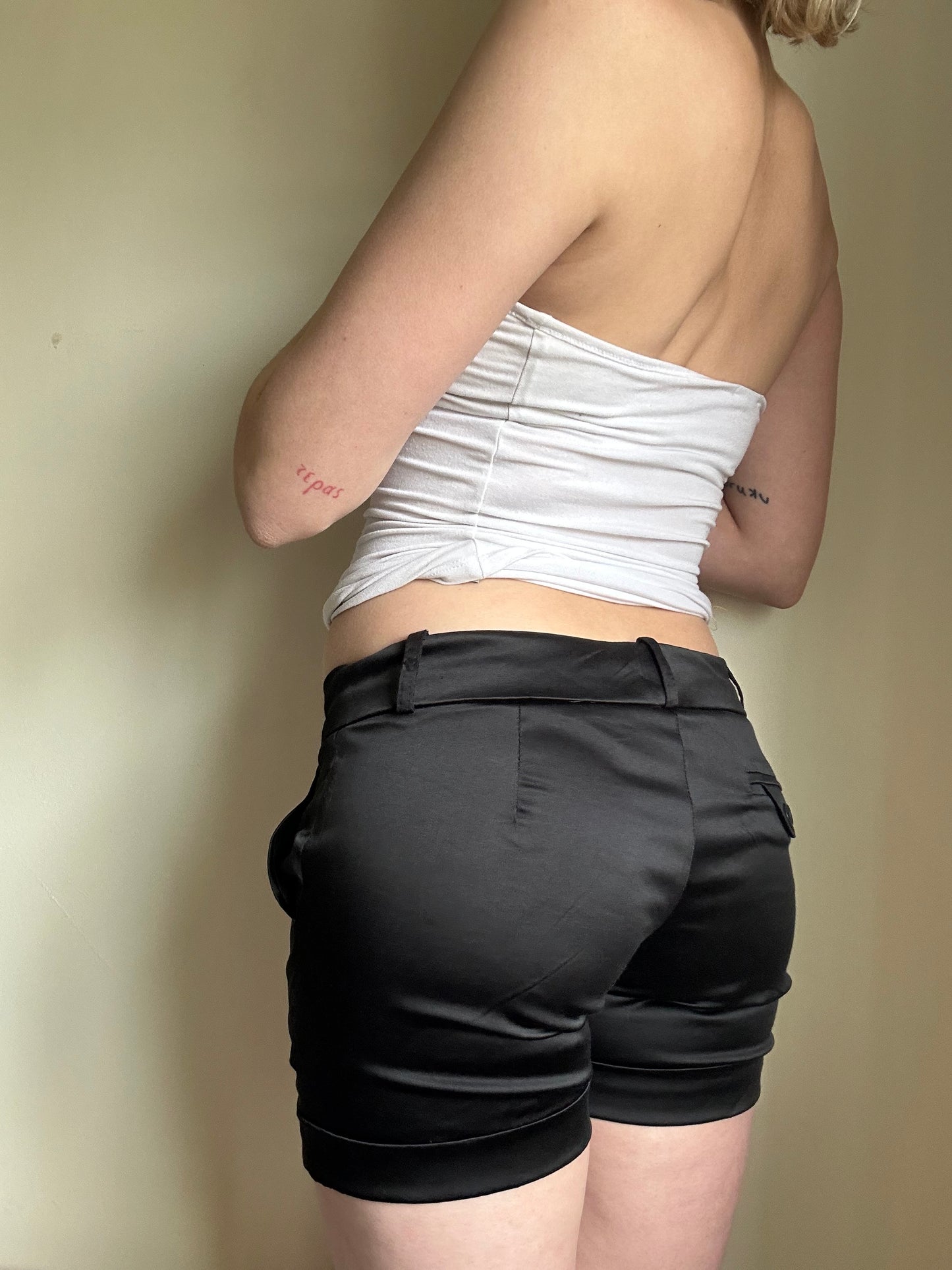 Shiny black hot pants