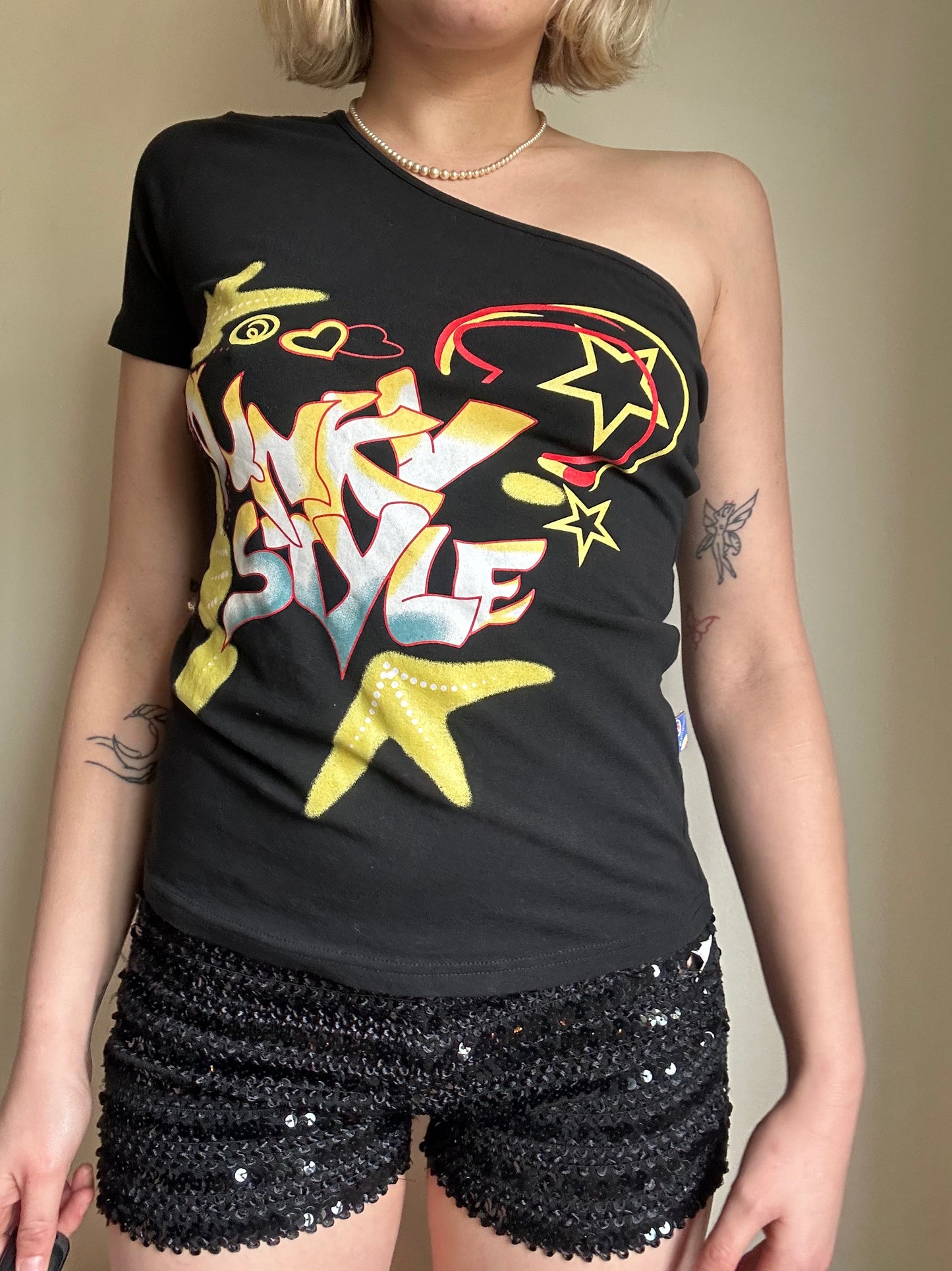 One shoulder graphic top