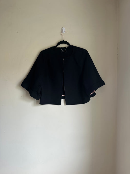 Poncho style cropped jacket