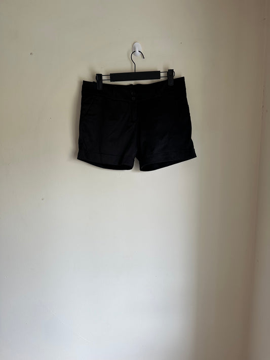 Shiny black hot pants
